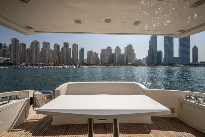 Richmind Yacht Photos Pics 2007 Azimut 68E yacht deck with city skyline view.