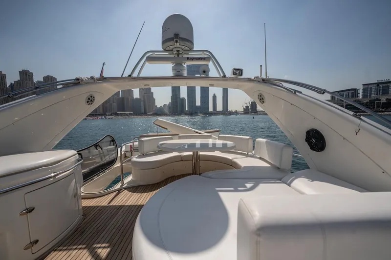 Richmind Yacht Photos Pics Luxurious 2007 Azimut 68E yacht deck with city skyline view.