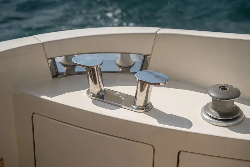 Richmind Yacht Photos Pics Deck fittings on a 2007 Azimut 68E yacht, featuring polished metal cleats.