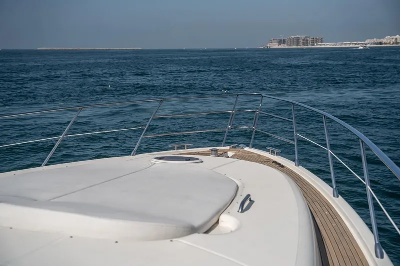 Richmind Yacht Photos Pics Bow view of 2007 Azimut 68E yacht cruising on open sea.