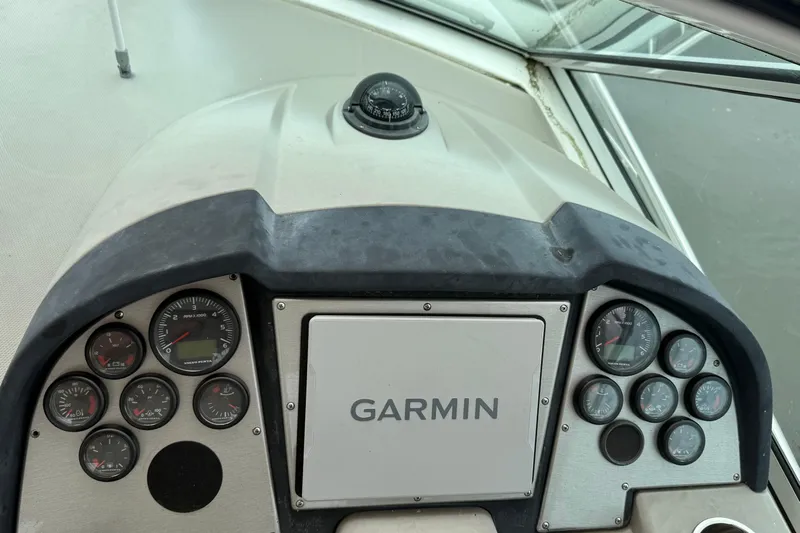 Yacht Photos Pics Dashboard of 2008 Cruisers Yachts 330 Express with Garmin navigation system.