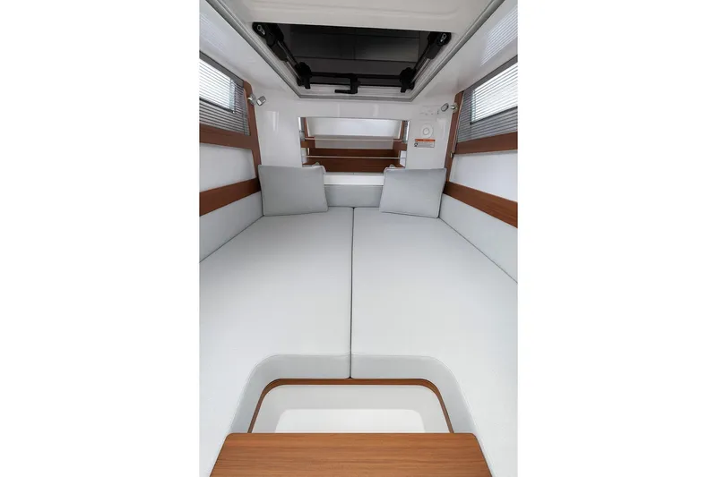  Yacht Photos Pics 2024 Axopar 28TT cabin interior with modern design and comfortable seating.