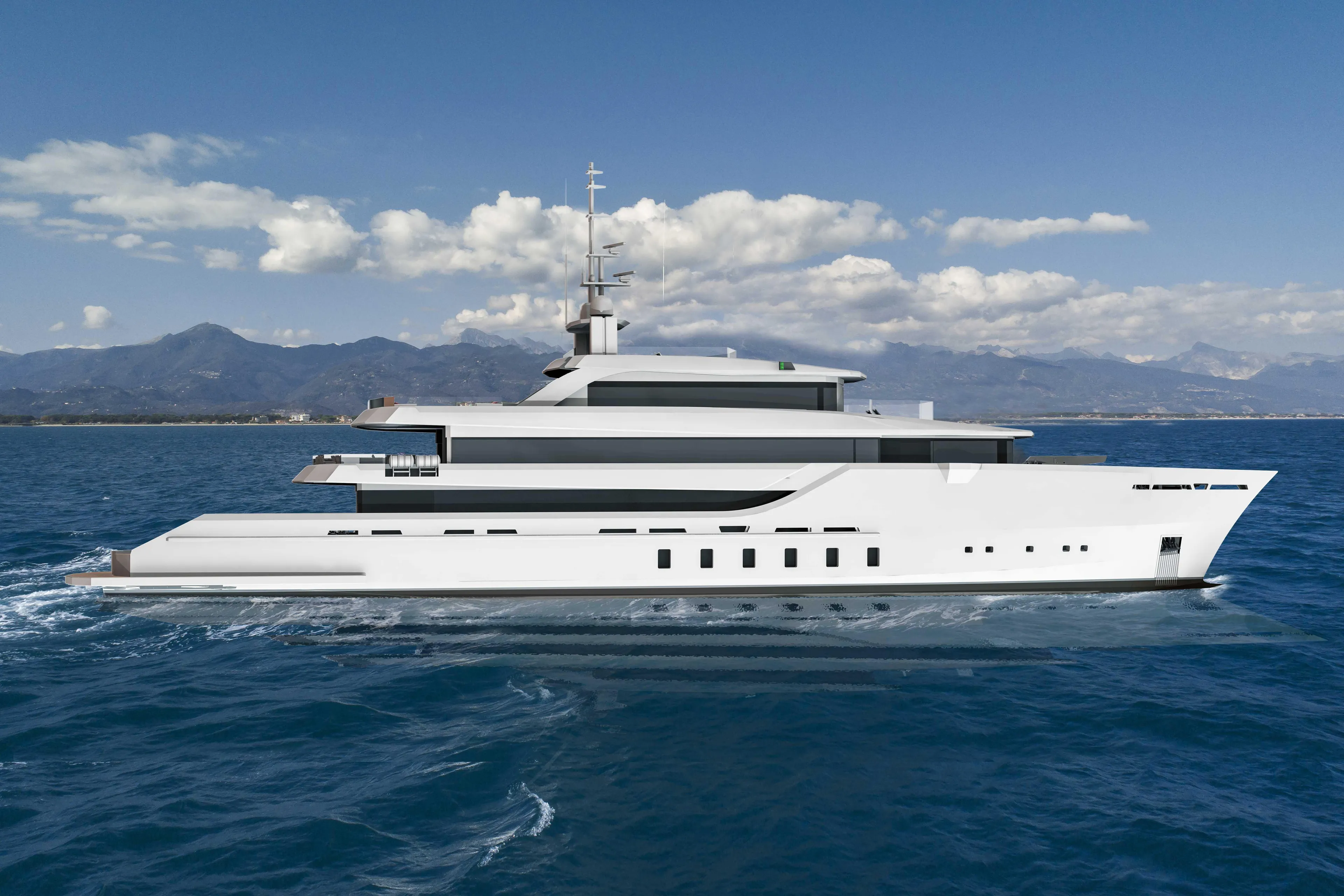Luxurious 2025 custom yacht cruising on open sea with mountainous backdrop.