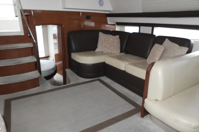  Yacht Photos Pics Interior of 2008 Carver 41 Cockpit Motor Yacht with plush seating and carpeted stairs.