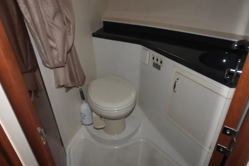  Yacht Photos Pics Bathroom in 2008 Carver 41 Cockpit Motor Yacht with toilet and sink.