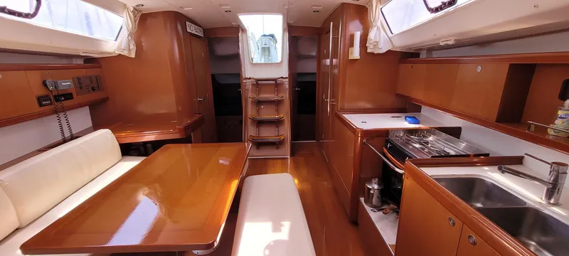 Latika Yacht Photos Pics Interior of 2011 Beneteau Oceanis 43 yacht, featuring wood finish and modern amenities.