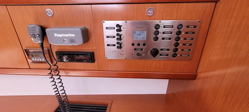 Latika Yacht Photos Pics Control panel of a 2011 Beneteau Oceanis 43 sailboat with Raymarine equipment.