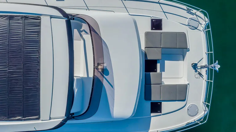 Au Natural Yacht Photos Pics Aerial view of 2023 Fountaine Pajot MY 6 yacht deck with seating area.