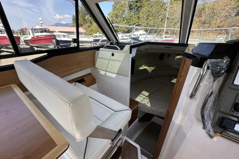  Yacht Photos Pics 2026 Cutwater C-248 Coupe interior with seating and cabin view.