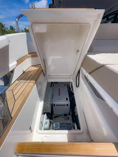  Yacht Photos Pics 2023 Fairline Targa 45 Open yacht storage compartment with generator.