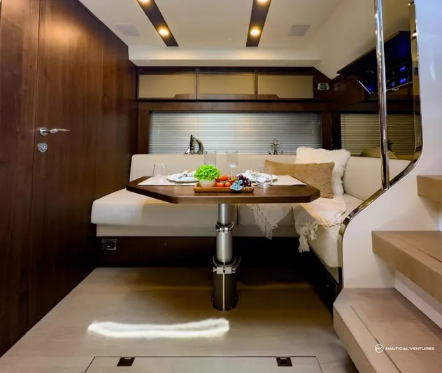  Yacht Photos Pics Luxurious interior of 2023 Fairline Targa 45 Open yacht with elegant dining area.