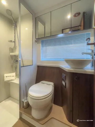  Yacht Photos Pics Modern bathroom in 2023 Fairline Targa 45 Open yacht with shower and vanity.