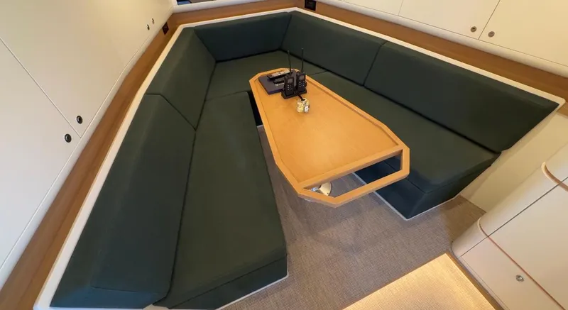 Eva Yacht Photos Pics Luxurious interior of 2022 Van der Valk Waterdream California 52 yacht with elegant seating.