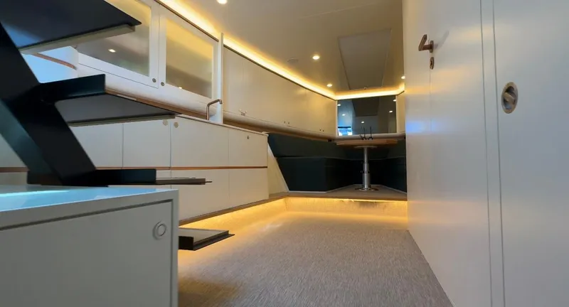 Eva Yacht Photos Pics Luxurious interior of 2022 Van der Valk Waterdream California 52 yacht, featuring modern design and ambient lighting.
