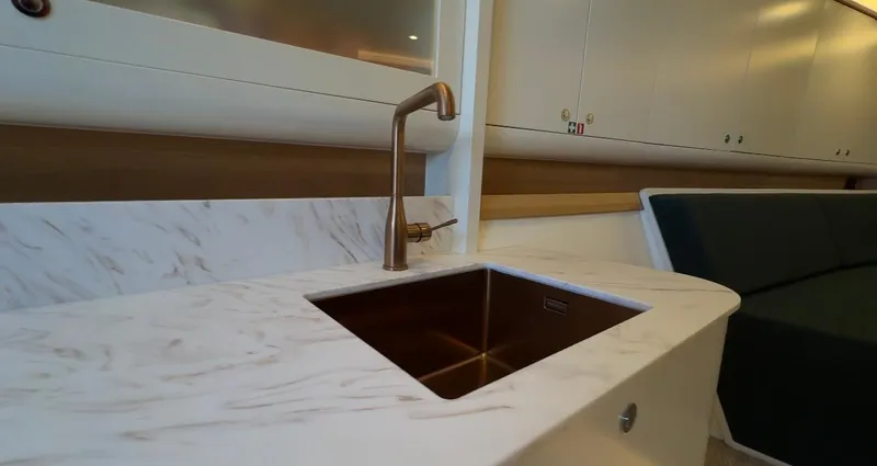 Eva Yacht Photos Pics Modern kitchen sink in 2022 Van der Valk Waterdream California 52 yacht interior.