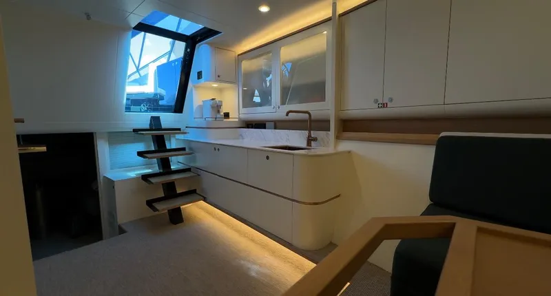 Eva Yacht Photos Pics Modern interior of 2022 Van der Valk Waterdream California 52 yacht with sleek kitchen design.