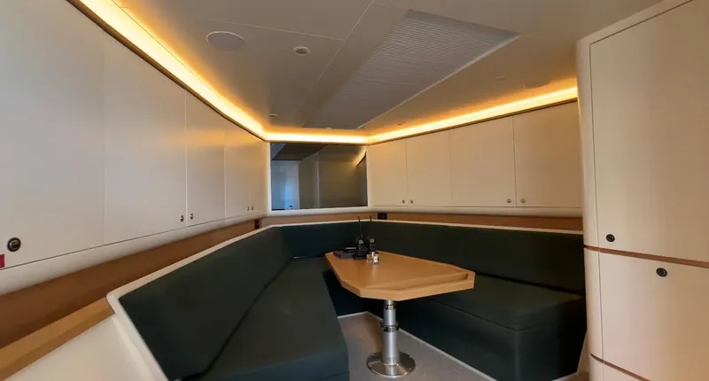Eva Yacht Photos Pics Luxurious interior of 2022 Van der Valk Waterdream California 52 yacht with modern seating and lighting.