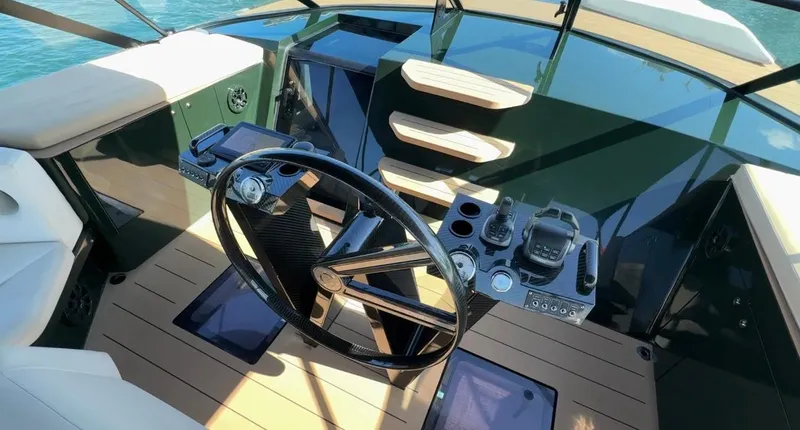 Eva Yacht Photos Pics Helm of 2022 Van der Valk Waterdream California 52 yacht with modern controls and steering wheel.