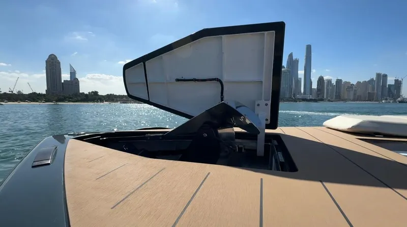 Eva Yacht Photos Pics 2022 Van der Valk Waterdream California 52 yacht with open hatch, city skyline in background.