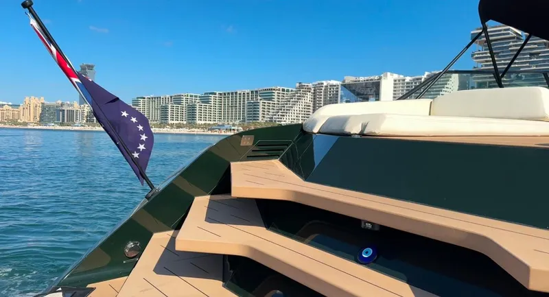 Eva Yacht Photos Pics Van der Valk Waterdream California 52 yacht, 2022 model, with city skyline in the background.