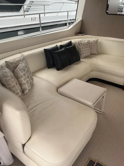 Asia 3 Yacht Photos Pics Luxurious interior of 2019 Azimut 60 yacht with elegant cream leather seating.