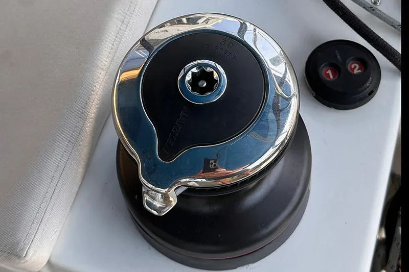 Nautical Dreamer Yacht Photos Pics Close-up of a winch on a 2019 Jeanneau Sun Odyssey 490 sailboat.
