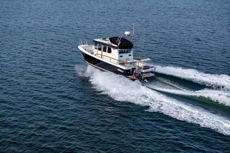  Yacht Photos Pics 2019 Targa 27.2 boat cruising on open water, creating a wake behind.