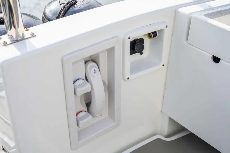  Yacht Photos Pics 2019 Targa 27.2 boat deck with control panel and fixtures.