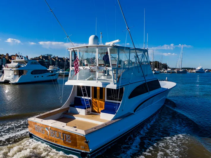  Yacht Photos Pics Custom Carolina 66 yacht, 2005 model, named "Big Blue" on the water.