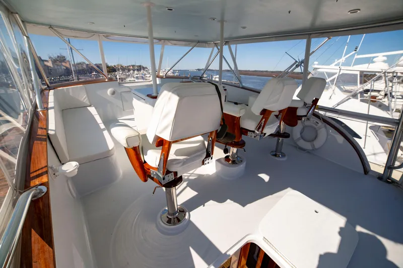  Yacht Photos Pics Custom Carolina 66 yacht interior, 2005 model, featuring luxurious seating and panoramic views.