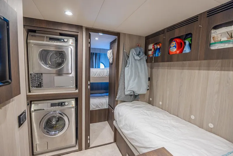 Enchante Yacht Photos Pics Main Crew Area with Laundry Washer, Dryer & Separate Quarters with Double Bunks