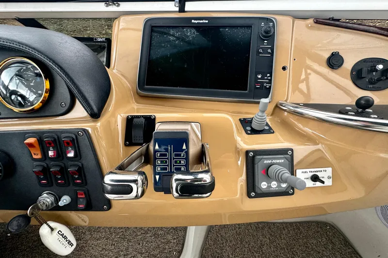  Yacht Photos Pics 2003 Carver 396 Motor Yacht dashboard with navigation controls and display.
