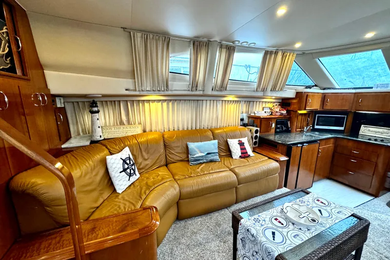  Yacht Photos Pics Luxurious interior of 2003 Carver 396 Motor Yacht with leather seating and modern amenities.