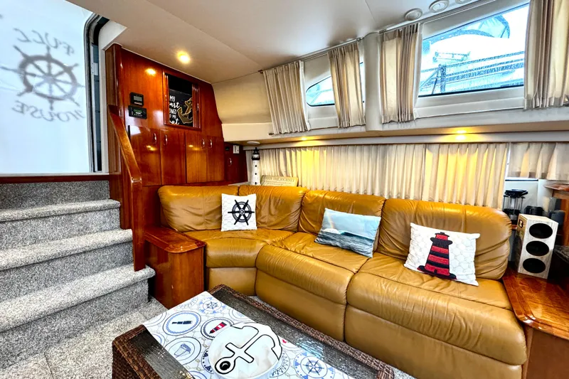  Yacht Photos Pics Interior of 2003 Carver 396 Motor Yacht with leather seating and nautical decor.