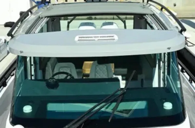 Problem Child Yacht Photos Pics 2017 Axopar 37 Cross Cabin boat, top view of cabin and windshield.