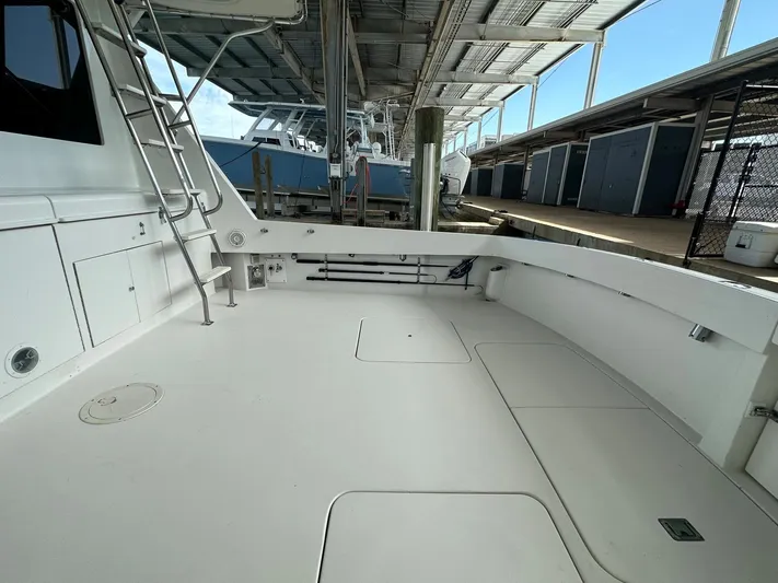 The Godfather Yacht Photos Pics 1986 Hatteras 52 Convertible yacht deck with ladder and storage compartments.