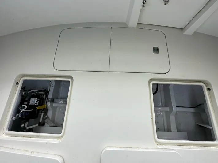 The Godfather Yacht Photos Pics 1986 Hatteras 52 Convertible boat deck with open storage compartments.