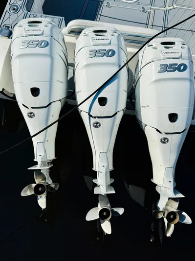  Yacht Photos Pics Three powerful outboard motors on a 2003 Fountain 38 TE boat.