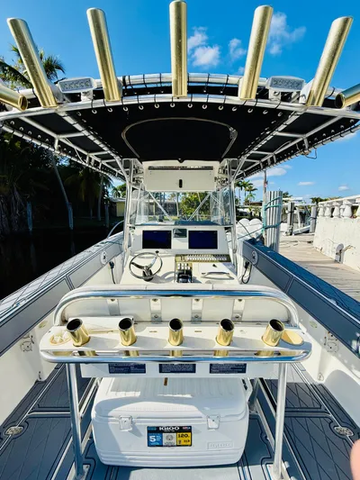  Yacht Photos Pics 2003 Fountain 38 TE boat with fishing rod holders and navigation equipment.
