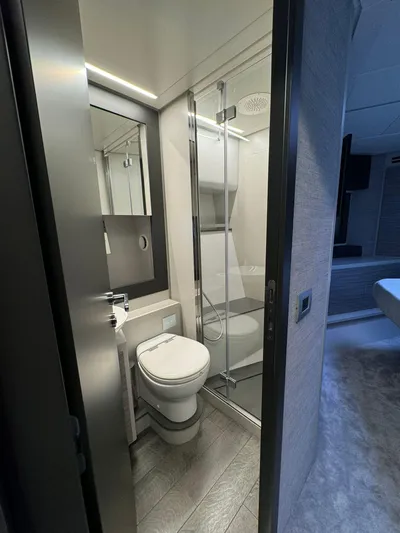  Yacht Photos Pics Modern bathroom in 2023 Pershing 6X yacht with shower and toilet.
