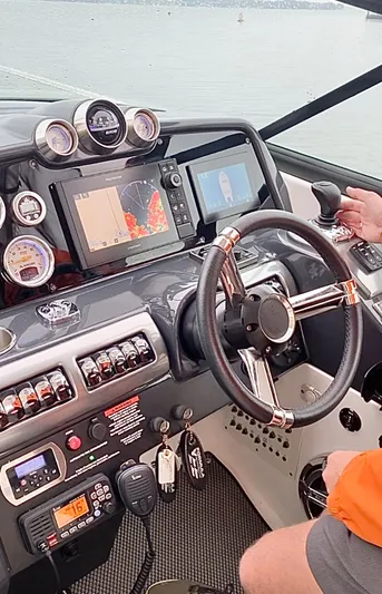  Yacht Photos Pics Cockpit of 2020 Formula 350 Sun Sport with navigation screens and controls.