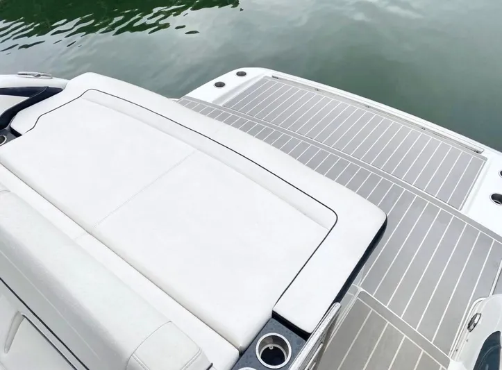  Yacht Photos Pics 2020 Formula 350 Sun Sport boat with sleek white seating and gray deck by the water.