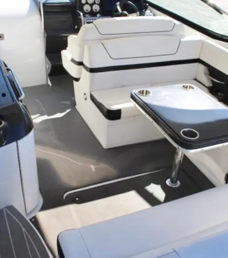  Yacht Photos Pics 2020 Formula 350 Sun Sport boat interior with seating and table.