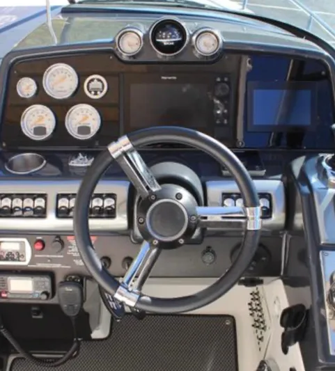  Yacht Photos Pics Dashboard of 2020 Formula 350 Sun Sport boat with steering wheel and gauges.