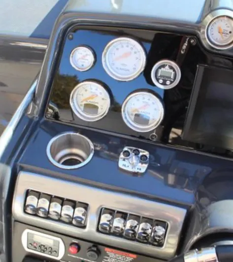  Yacht Photos Pics Dashboard of a 2020 Formula 350 Sun Sport boat with gauges and controls.