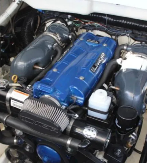  Yacht Photos Pics 2020 Formula 350 Sun Sport engine with blue cover and detailed components.