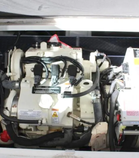  Yacht Photos Pics Engine compartment of a 2020 Formula 350 Sun Sport boat, showcasing mechanical components.