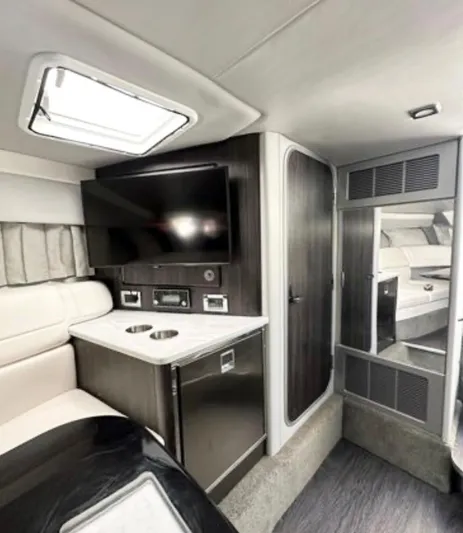  Yacht Photos Pics Interior of 2020 Formula 350 Sun Sport boat with TV, seating, and modern amenities.