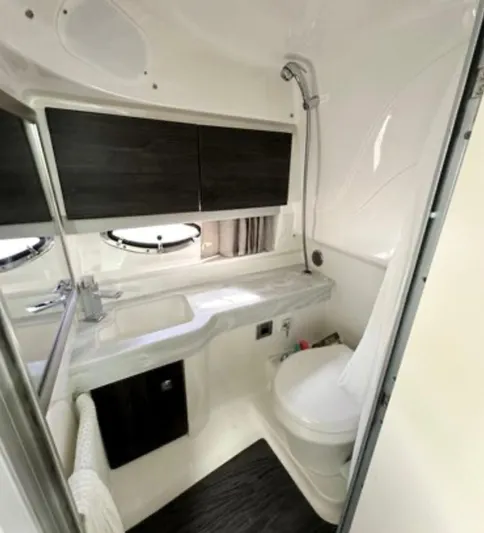  Yacht Photos Pics 2020 Formula 350 Sun Sport bathroom with modern fixtures and compact design.