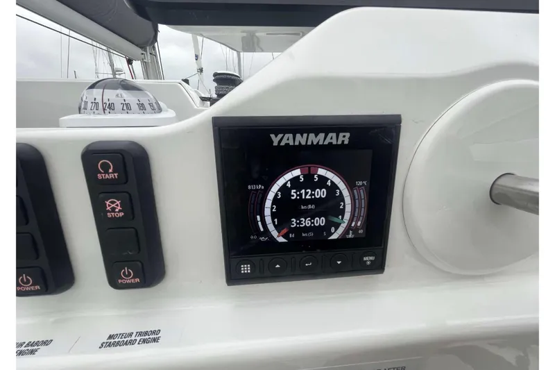 Fonn Taistil Domhain Yacht Photos Pics Control panel of 2025 Fountaine Pajot 41 yacht with Yanmar display and compass.